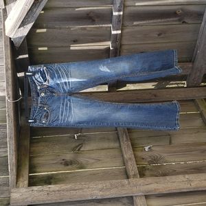 Blue Asphalt Flared Jeans with Thick Stitching Detail and Distressed Whiskering